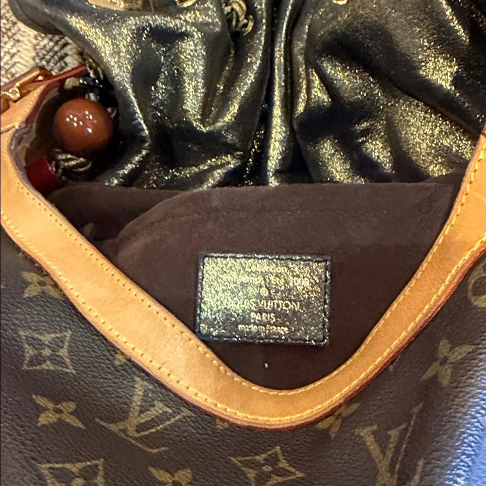 Louis Vuitton Brown Monogram Drawstring Shoulder Bag circa 2009